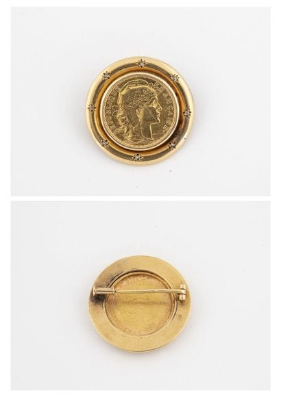Round brooch in yellow gold (750) holding...