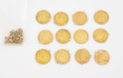 Lot of 12 pieces of 10 francs gold. 

Traces...