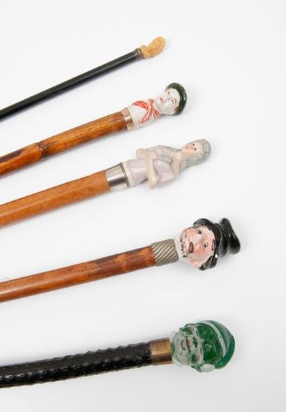 Lot of 5 canes:
- one with a ceramic pommel...
