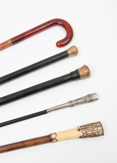 Set of 5 canes:
- one with a trapezoidal...