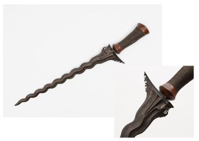 INDONÉSIE
Kriss. 
Wooden handle and braided...