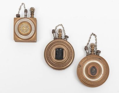 Three petrol lighters.
Brass cases decorated...