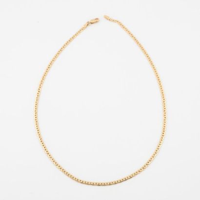 Neck chain in yellow gold (750) with flattened...