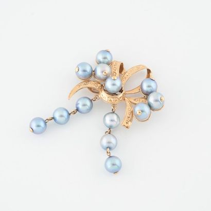 Yellow gold brooch (750) in the form of a...