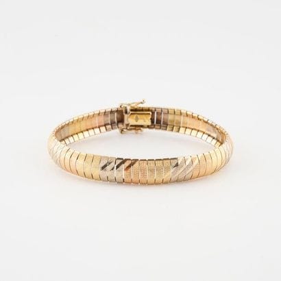Bracelet ruban en or jaune (750) de trois...