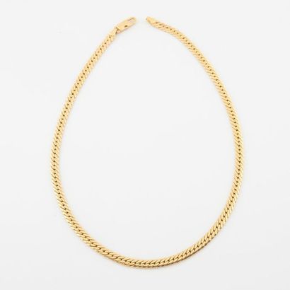 Collier en or jaune (750) à maille gourmette...