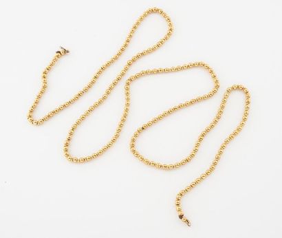Long necklace made of alternating yellow...