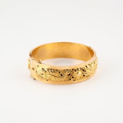 Bracelet jonc ouvrant en or jaune (750) creux,...