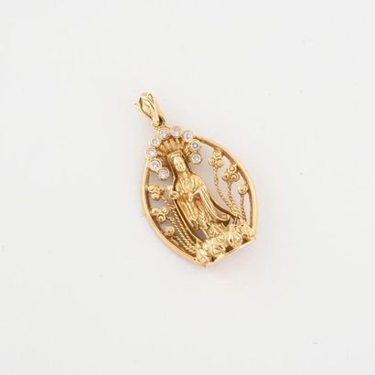 Pendentif en or jaune (750) ajouré figurant...