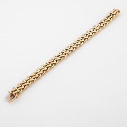 Bracelet ruban articulé en or jaune (750)...