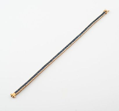 Articulated line bracelet in yellow gold...