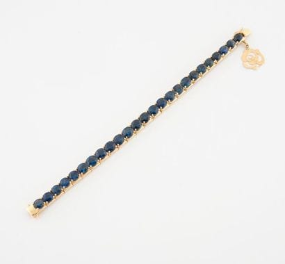 Bracelet ligne en or jaune (585) orné de...