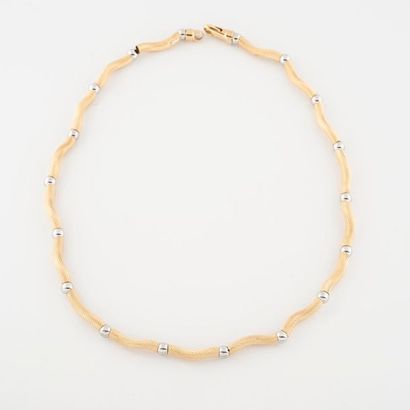 Amusing necklace made of yellow gold beads...
