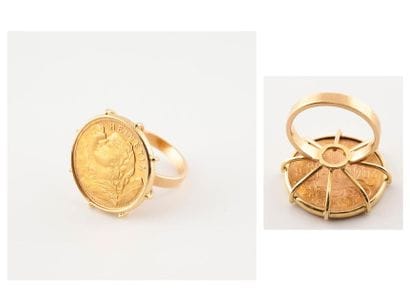 Bague en or jaune (750) ornée d'une pièce...