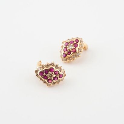 Pair of diamond shaped earrings in yellow...