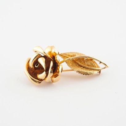 Brooch in yellow gold (750) depicting a blooming...