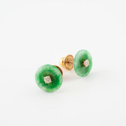 Pair of yellow gold ear studs (750) adorned...