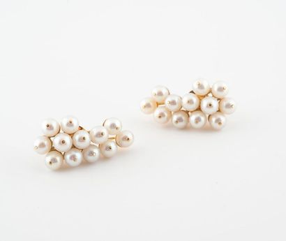 Pair of yellow gold (585) earrings made of...