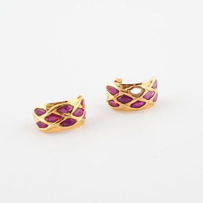 Pair of yellow gold (750) convex earrings...
