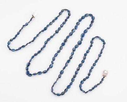 Long necklace made of a drop of faceted oval...