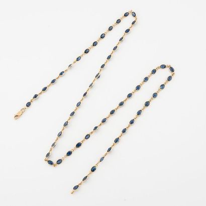Long necklace in yellow gold (750) formed...