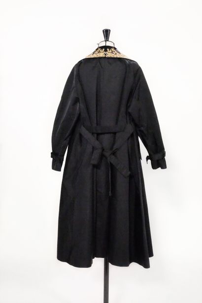 Guo Pei

A Couture coat embroidered with...