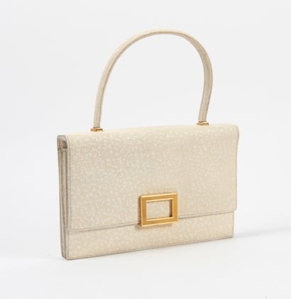 HERMES Paris

Sac à main en béluga.




Fermeture...