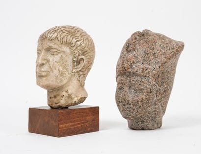 Deux têtes sculptées en pierre, dans le goût...