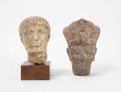 Deux têtes sculptées en pierre, dans le goût...