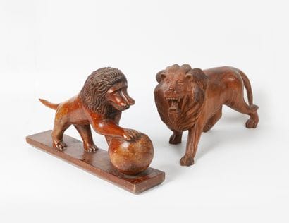 Deux sculpture en bois :

- Lion. 

21 x...