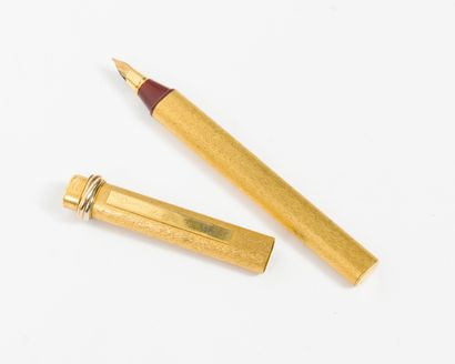 CARTIER Paris, Trinity 
Brushed gold metal...