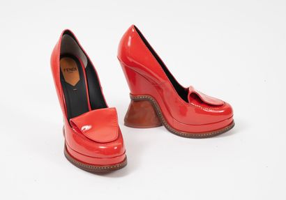 FENDI Roma
Pair of coral patent leather loafers,...
