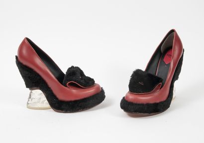 FENDI Roma
Pair of red brown leather and...