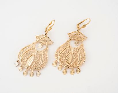 Pair of gilded metal earrings with filigree...