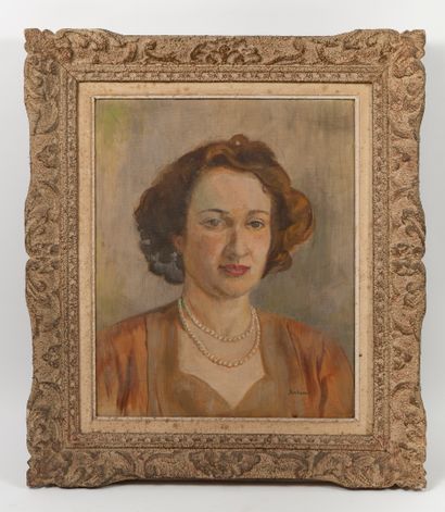 Ecole du XXème siècle.
Portrait de femme.

Huile...