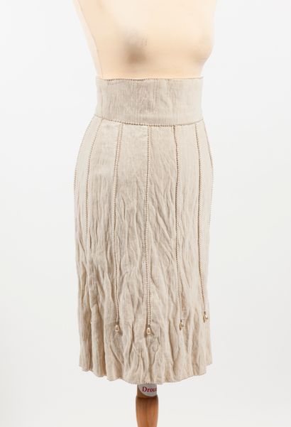 CHANEL
Straight skirt length below the knee...
