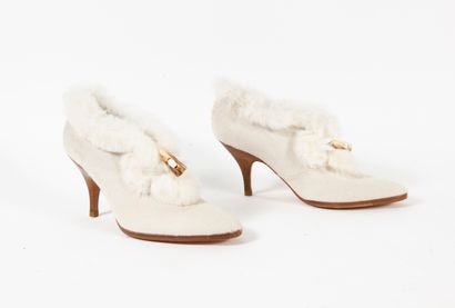 Salvatore FERRAGAMO
Paire de low boots façon...