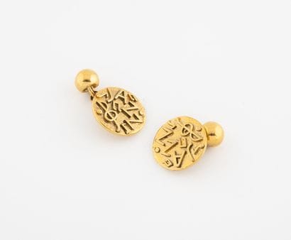 Yves Saint LAURENT
Pair of gilt metal 