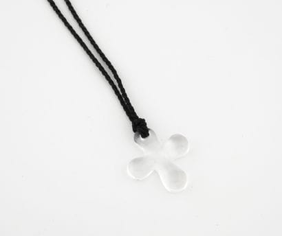 BACCARAT
Colorless molded glass cross pendant...