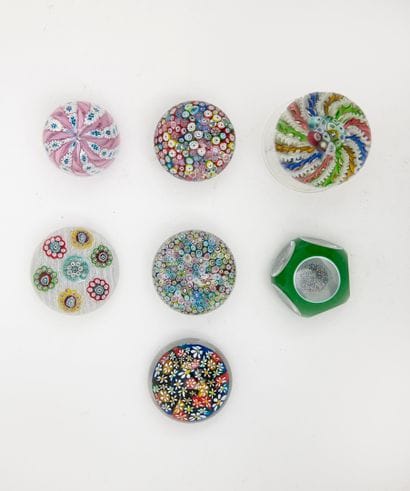Set of 7 paperweight balls: 

- Three paperweight...