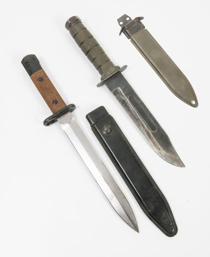 Two daggers :

- one complete, wooden handle.

-...