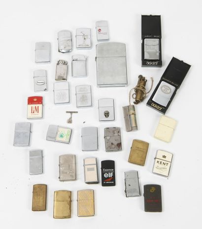 31 Zippo lighters, including one large one...