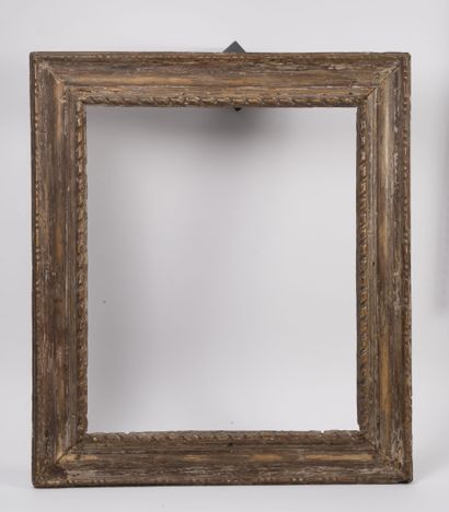 Cadre en bois et stuc doré 