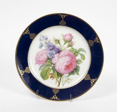 SÈVRES
White porcelain plate with polychrome...