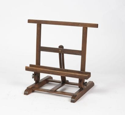 Stained wood table stand, articulated.

20th...