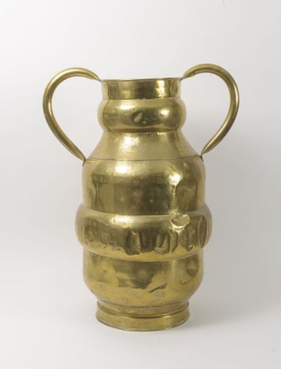 Large brass can with swollen body and two...
