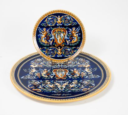 GIEN
Two circular earthenware dishes decorated...