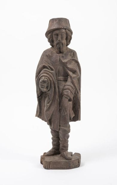Homme donnant son obole.

Sculpture en bois....