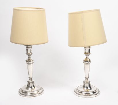 Pair of silver plated metal torches.

Mounted...