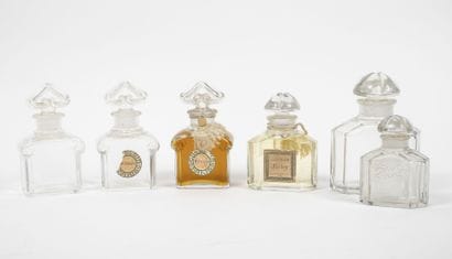 GUERLAIN & BACCARAT
Lot of four perfume bottles...